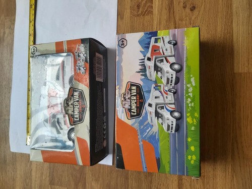 Two toy campervans - two,
